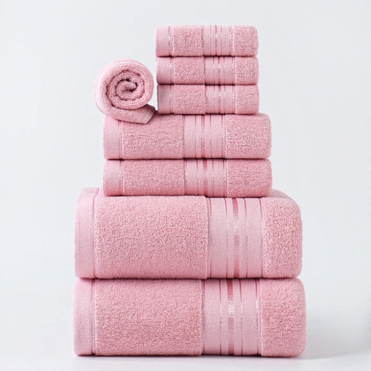 Stack of pink towels on a white background