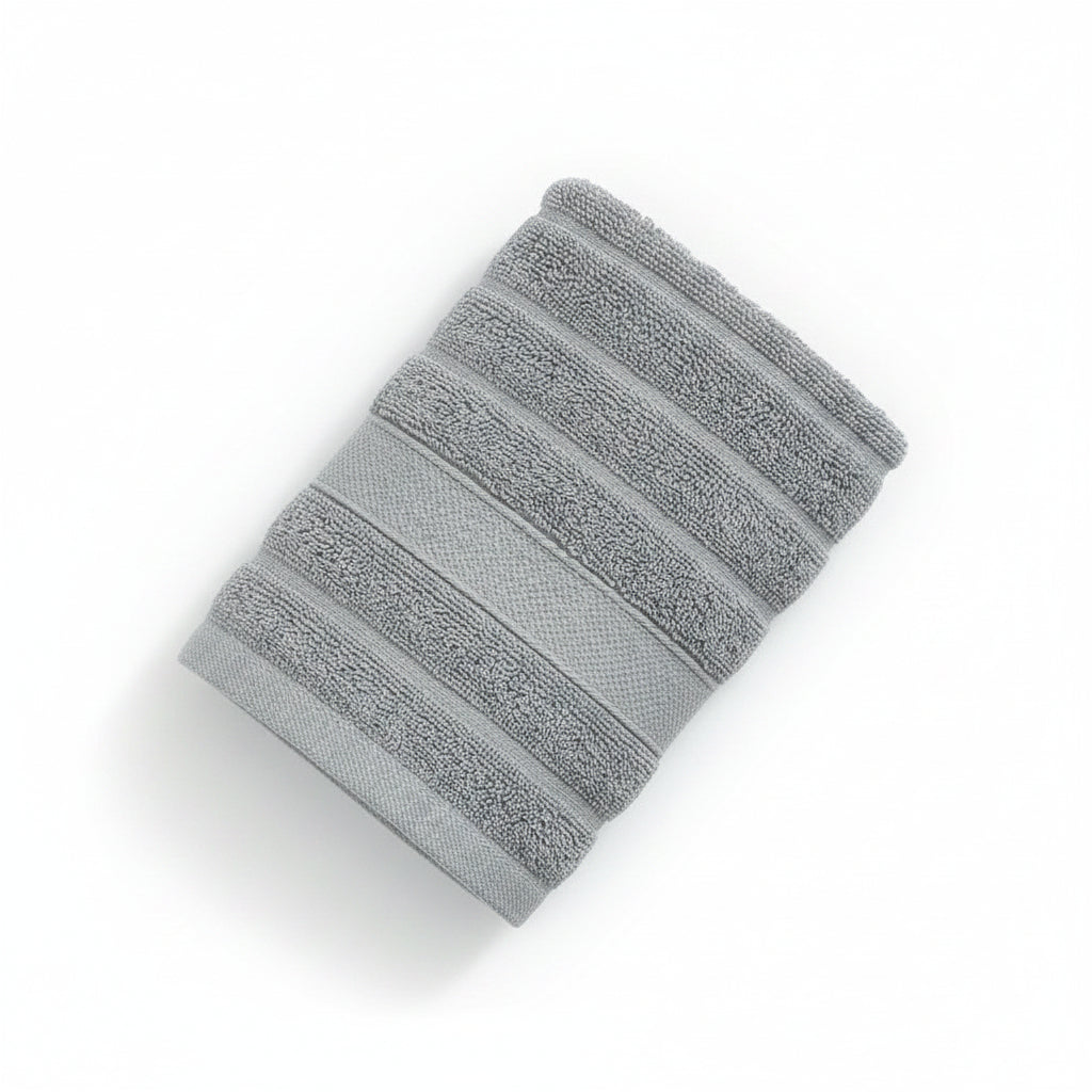 Stack of gray towels on a dark blue background