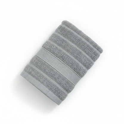 Stack of gray towels on a dark blue background