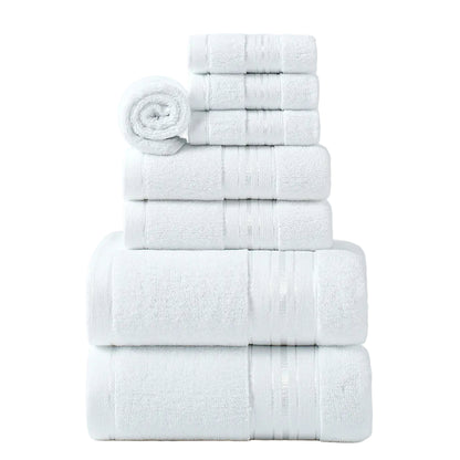 Stack of white towels on a light gray background
